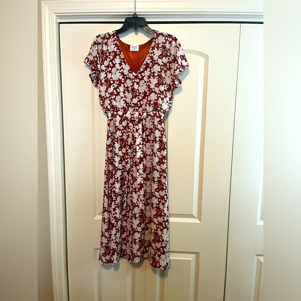 Sienna Sky fully lined extra small V-neck flutter sleeve tie waist maxi dress.
